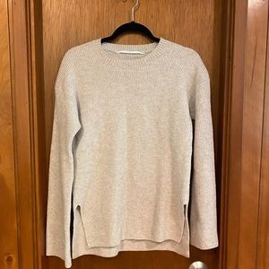 Athletes bell sleeve sweater